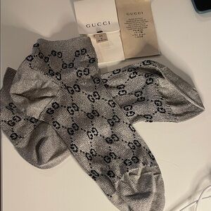BRAND NEW Gucci Ankle Socks in gray lamé with the black interlocking GG pattern